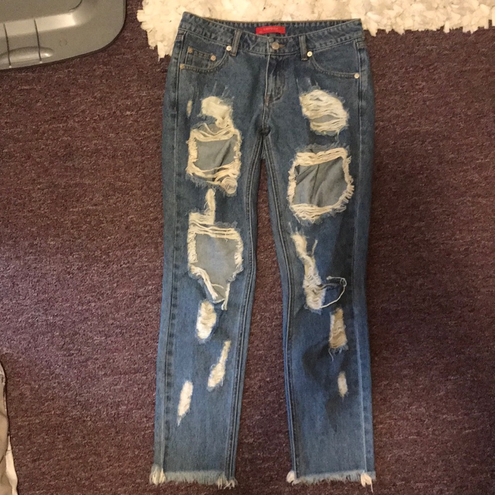 Ripped Fringe Bottom Jeans